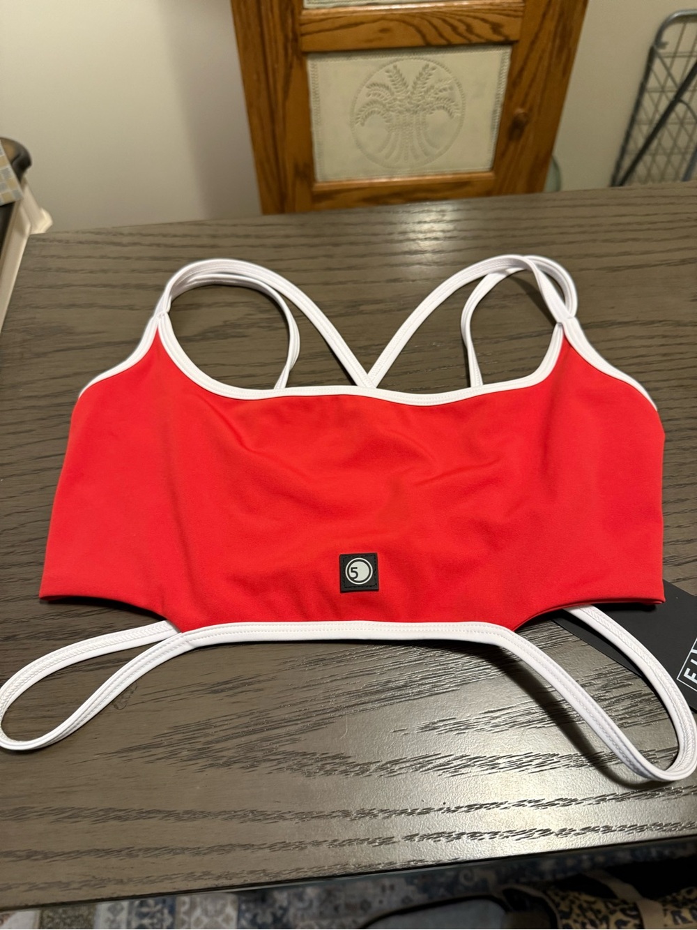 Sporty Red Women's dance wear top , never worn brand new red with white trim
